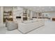 Spacious living room with cozy seating, stylish fireplace, and open floor plan at 3104 Conners Dr, Las Vegas, NV 89107