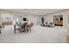 Open-concept living space with multiple dining and living areas, and lots of light at 3104 Conners Dr, Las Vegas, NV 89107