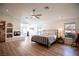 Spacious main bedroom with vaulted ceilings, fireplace, and ample natural light at 3236 Cliff Sieler Ct, Las Vegas, NV 89117