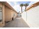 Side yard with concrete, landscaping, and a sports goal at 3236 Cliff Sieler Ct, Las Vegas, NV 89117