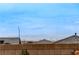 A block wall surrounds the property with views of the city and mountains in the distance at 348 Cadence Vista Dr, Henderson, NV 89011