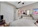 Spacious bedroom featuring a ceiling fan and neutral paint at 348 Cadence Vista Dr, Henderson, NV 89011