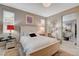Inviting bedroom with neutral tones, stylish décor, and a view to a walk-in closet at 348 Cadence Vista Dr, Henderson, NV 89011