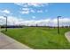 A community park with lush green grass and walking paths at 348 Cadence Vista Dr, Henderson, NV 89011