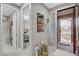 Inviting entryway showing views to the bathroom, the bedroom, and the decorated front door at 348 Cadence Vista Dr, Henderson, NV 89011