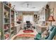 Well-organized home office with built-in shelving, a ceiling fan, and desk at 348 Cadence Vista Dr, Henderson, NV 89011