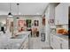 A close-up on the kitchen island showcases granite countertops, stainless steel sink, and decor at 348 Cadence Vista Dr, Henderson, NV 89011