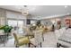 Bright and airy living space with dining area and access to the outdoor patio at 348 Cadence Vista Dr, Henderson, NV 89011