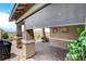 Covered patio with sunshades for flexible light control, showing brick pavers and stucco pillars at 348 Cadence Vista Dr, Henderson, NV 89011