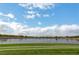 Picturesque community pond surrounded by lush greenery, creating a tranquil and scenic environment at 348 Cadence Vista Dr, Henderson, NV 89011