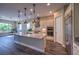 Lovely kitchen with granite countertops, stainless appliances, and an island with bar seating at 3486 Molinos Dr, Las Vegas, NV 89141