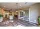 Bright dining area showcasing hardwood floors and sliding glass doors leading to the patio at 3486 Molinos Dr, Las Vegas, NV 89141