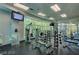 Contemporary fitness center featuring weightlifting equipment and a view of the surrounding landscape at 38 E Serene Ave # 432, Las Vegas, NV 89123