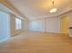 Spacious living area features laminate flooring, neutral paint, and a sliding glass door at 38 E Serene Ave # 432, Las Vegas, NV 89123