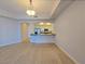 Bright living room showcasing the open layout and seamless connection to the kitchen area at 38 E Serene Ave # 432, Las Vegas, NV 89123