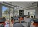 Comfortable lounge area with views of exterior landscape, featuring seating, tables, and a library at 38 E Serene Ave # 432, Las Vegas, NV 89123