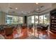 Well-lit resident lounge featuring comfortable seating arrangements and large windows with exterior views at 38 E Serene Ave # 432, Las Vegas, NV 89123