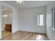 Bright bedroom with hardwood floors and an en-suite bathroom offering seamless living at 3920 Smokey Fog Ave # 201, North Las Vegas, NV 89081