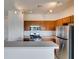 Well-equipped kitchen features stainless steel appliances, ample counter space, and bright lighting at 3920 Smokey Fog Ave # 201, North Las Vegas, NV 89081