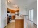 The kitchen has stainless appliances, a breakfast bar, and access to outdoor space at 3920 Smokey Fog Ave # 201, North Las Vegas, NV 89081