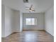 Spacious living room featuring stylish floors, neutral walls, and natural light from a large window at 3920 Smokey Fog Ave # 201, North Las Vegas, NV 89081