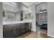 Stylish bathroom featuring double vanity, sleek mirrors and great lighting at 398 Frank Case Ln, Henderson, NV 89011