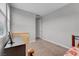 Cozy bedroom featuring a desk and chair near a window, providing ample space and light at 398 Frank Case Ln, Henderson, NV 89011