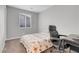 Comfortable bedroom featuring a bed, desk, and chair for work or study at 398 Frank Case Ln, Henderson, NV 89011