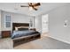 Comfortable bedroom featuring a ceiling fan and neutral decor at 398 Frank Case Ln, Henderson, NV 89011
