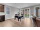 Dining area with hardwood floors, natural light and table with seating for the Gathering at 398 Frank Case Ln, Henderson, NV 89011