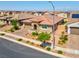 Well-maintained single-story home featuring desert landscaping, a two-car garage, and a welcoming entrance at 398 Frank Case Ln, Henderson, NV 89011