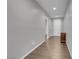 Bright hallway with hardwood floors, leading to other rooms in the home at 398 Frank Case Ln, Henderson, NV 89011