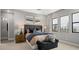 Comfortable bedroom space showcasing natural light, elegant decor, and side tables at 489 Carter House Way, Las Vegas, NV 89138