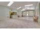 Large meeting room featuring tile floors, a kitchenette, and ample seating at 500 Quail Bird Pl, Henderson, NV 89052