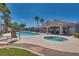 Community pool and hot tub with lounge chairs for relaxation and enjoyment at 500 Quail Bird Pl, Henderson, NV 89052