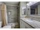 Modern bathroom with tiled shower and granite countertop at 5132 Springland St, Las Vegas, NV 89146