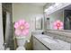Bathroom featuring decorative accents, granite countertops and tiled shower at 5132 Springland St, Las Vegas, NV 89146