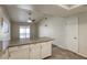 Bright eat-in kitchen featuring granite countertops and a ceiling fan at 5132 Springland St, Las Vegas, NV 89146