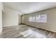 Bright and open living room featuring wood-look floors and neutral paint at 5132 Springland St, Las Vegas, NV 89146