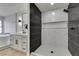 Nicely remodeled bathroom showcasing a walk-in shower and a modern vanity at 5151 Tennis Ct, Las Vegas, NV 89120