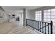 Bright foyer offering a view into the remodeled kitchen with stainless appliances and updated fixtures at 5151 Tennis Ct, Las Vegas, NV 89120