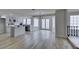 Bright kitchen and dining area with island, stainless appliances, and plenty of natural light at 5151 Tennis Ct, Las Vegas, NV 89120