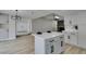 Spacious living room showcases an open layout to the kitchen and dining area, perfect for entertaining at 5151 Tennis Ct, Las Vegas, NV 89120