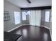 Charming dining area with stylish light fixture, decorative shelving, and ample natural light at 5217 Yellow Dawn Ct, Las Vegas, NV 89130