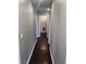 Hallway featuring dark wood flooring and neutral painted walls at 5217 Yellow Dawn Ct, Las Vegas, NV 89130