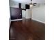 Bright, open living room with wood flooring, neutral colors, high ceilings, and smooth transitions at 5217 Yellow Dawn Ct, Las Vegas, NV 89130