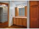 Bathroom features wood cabinets, walk in closet, and ample storage at 5401 Indian Hills Ave, Las Vegas, NV 89130