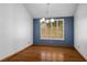 Well-lit dining room with stylish chandelier and large window with shutters at 5401 Indian Hills Ave, Las Vegas, NV 89130