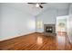 Bright living room featuring wood floors, vaulted ceiling, and fireplace at 5401 Indian Hills Ave, Las Vegas, NV 89130