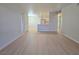Bright open-concept living area with kitchen and dining area at 5710 E Tropicana Ave # 1018, Las Vegas, NV 89122